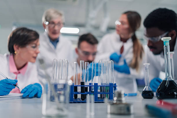 istock Diverse team of scientists conducting chemical experiments in laboratory 2252280089