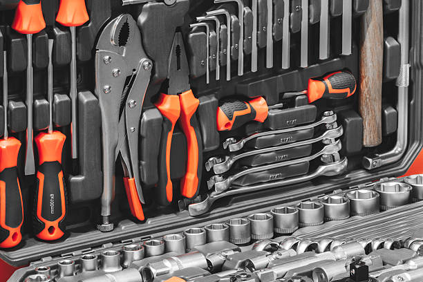 istock A toolbox full of tools including wrenches, pliers, and screwdrivers. The tools are organized and ready for use 2252282480