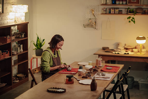 istock Woman working with clay during pottery workshop 2252283886