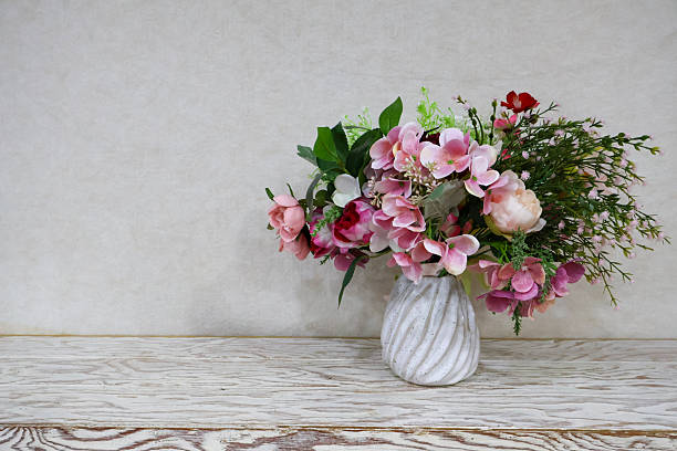 istock Floral Bouquet in Ceramic Vase on Neutral Background with Copy Space 2252287651