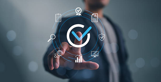 istock Conceptual photograph of a hand touching a quality control icon representing standards, compliance and assurance in a modern technology context 2252288566