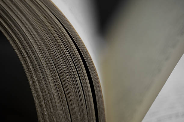 istock Curled paper edges show texture and detail 2252290856