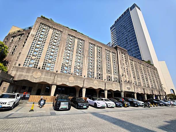 Facade of 1933 Old Millfun, a complex of restaurants and shops in Hongkou District of Shanghai, China. The concrete structures once housed the Shanghai Municipal Council Slaughterhouse, the largest slaughterhouse in Shanghai at the time.