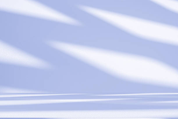 istock Studio style background wall decoration presentation uses white and blue tones. with shadows cast from a nearby window, concept creating a decorative 2252295632