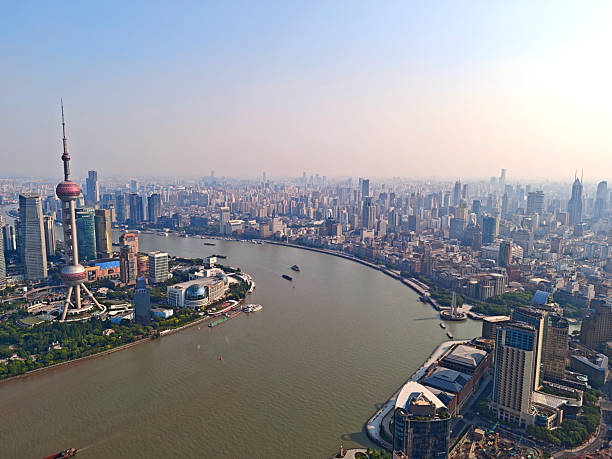 Shanghai cityscape and the Huangpu river, viewed from the Stage at Sinar Mas Center skyscraper in the North Bund.  China