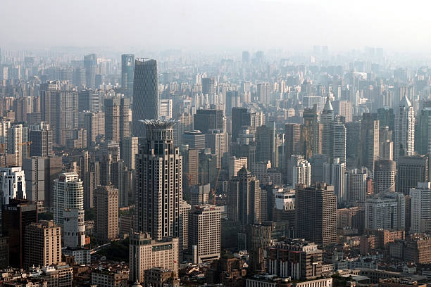 Shanghai Puxi cityscape viewed from the Stage at Sinar Mas Center skyscraper in the North Bund.  China