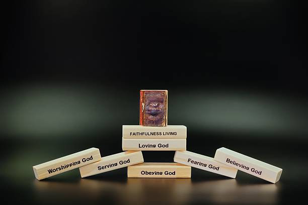 istock Faithfulness Living Wooden Blocks Stack Old Leather Bible On Top 2252304755