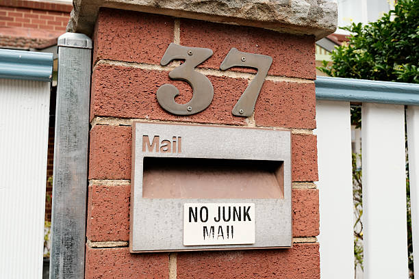 istock No Junk Mail sign on a mailbox in a brick wall 2252307208