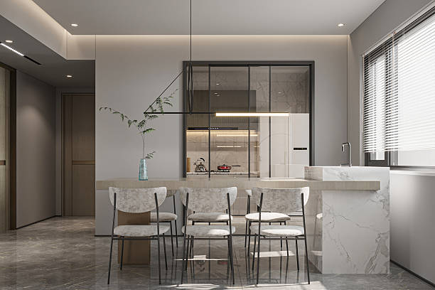 istock Luxurious Modern Open Plan Kitchen and Dining Area with Minimalist Furniture and Designer Lighting 2252307931