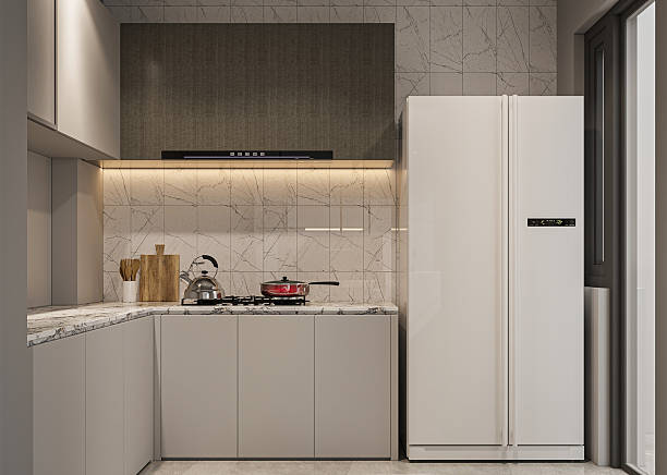 istock Modern Kitchen Corner with Gray Cabinetry, Marble Tile Backsplash, Built-in Hood, and Large White Refrigerator. 2252308396