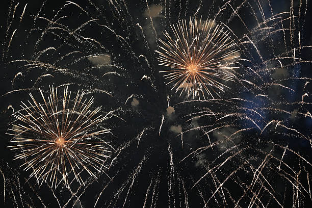 istock Spectacular Golden Fireworks Displays on a Black Night Sky 2252310978