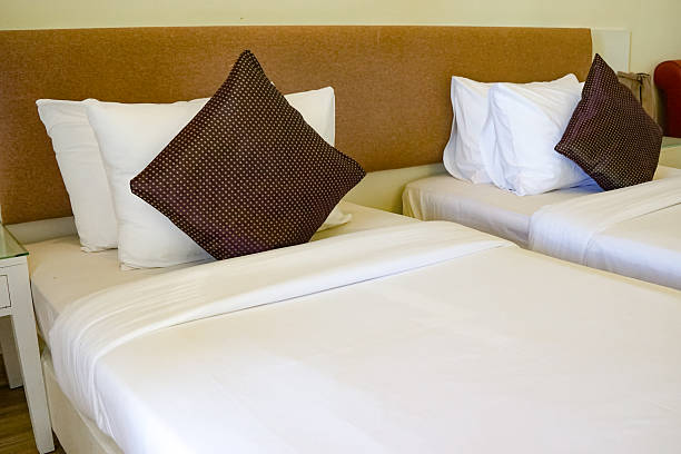 istock Cozy Bedroom Interior with Elegant Bedding Setup 2252324354