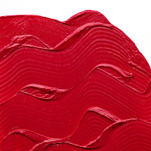 istock Abstract texture background of a red lipstick smear. 2252329503