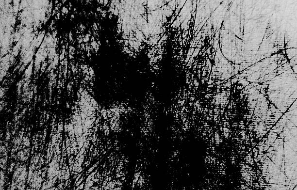 istock Abstract black and white grunge texture with dark ink stains and rough scratched surface. Distressed background for design, poster, cover, print. 2252331798