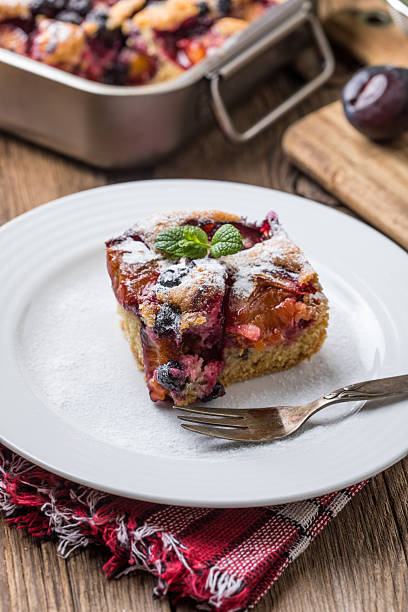 istock Yeast cake with plums and blueberries. 2252332120