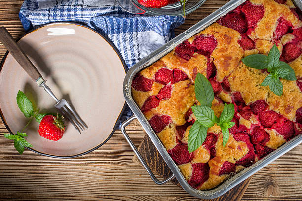 istock Yeast cake with strawberry in a mold. 2252332129