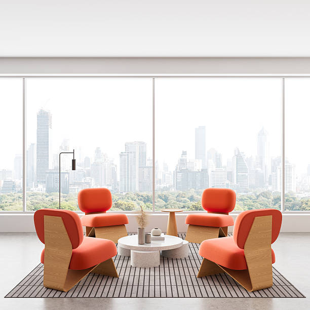istock Modern interior lounge with orange chairs and cityscape view through large windows in minimalist white room setting. 3D Rendering 2252333219