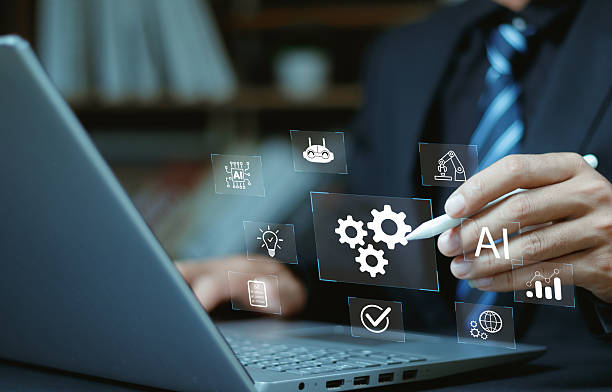 istock RPA, Robotic process automation concept. Businessman use laptop with virtual automation technology for automate business tasks with AI. Digital transformation and change management. 2252335195