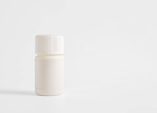 istock White plastic medicine bottle resting on white background 2252335353