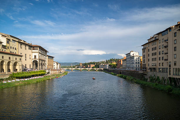 The Arno river and the famous buildings that flank it in the old part of florence, shoot from Ponte Vecchio