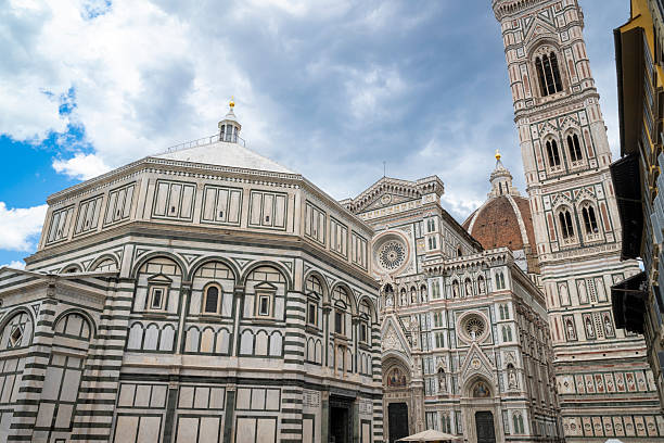 Florence, Italy - 04/2018: Florence Cathedral, formally the Cathedral of Saint Mary of the Flower, is the cathedral of the Catholic Archdiocese of Florence. The Renaissance city is of the Medici dynasty, with works of art by Brunelleschi, Michelangelo, Giotto, Leonardo da Vinci, Botticelli and many others.