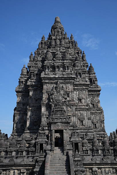 Sunlit Borobudur Temple, magnificent example of 9th-century Buddhist architecture, Java, Indonesia.