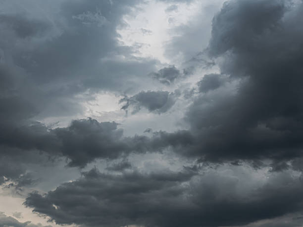 istock Storm Clouds background.Dark clouds block out the sun before the storm 2252352982