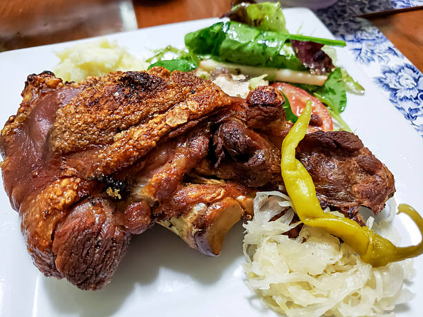 Roasted pork hock with crackling skin and some of the lean meat exposed