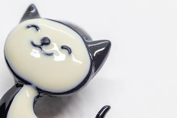 istock Cute cat figure, black and white colors, macro 2252353415