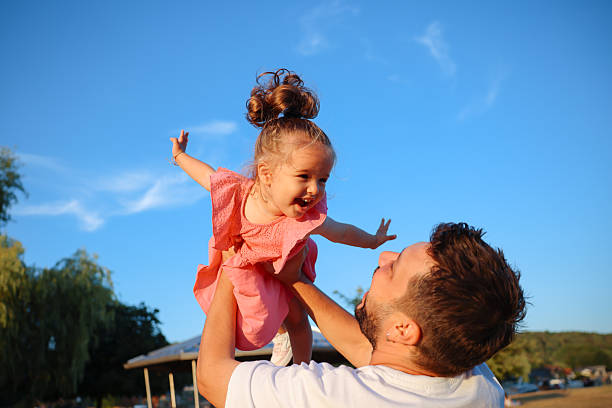 istock Father and daughter moments spending time in nature 2252356094