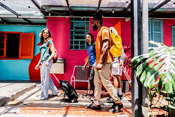 istock Young friends arriving on hostel 2252356291
