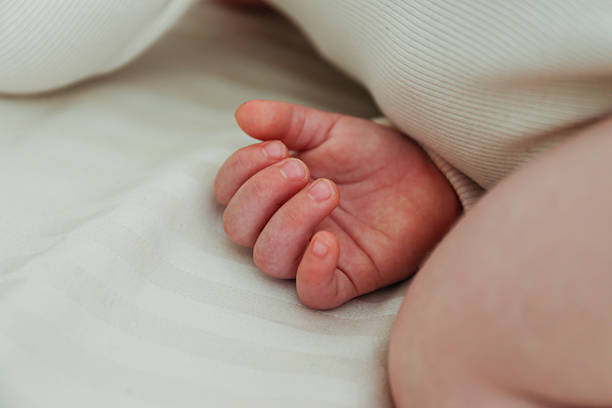 istock Close up of infant's heels. 2252356429