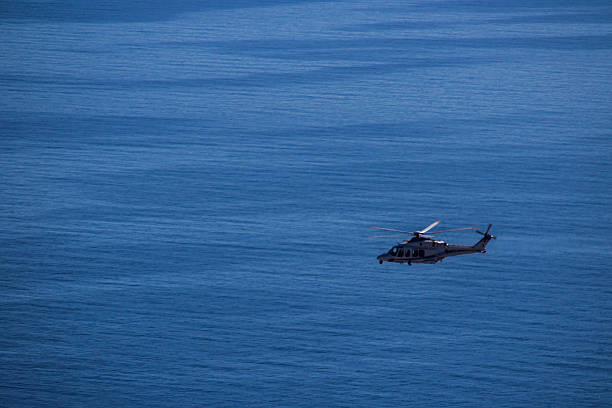 istock helicopter flying in the sky 2252357345