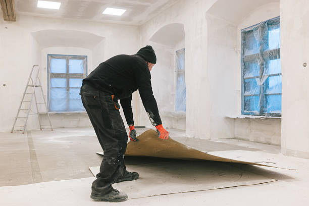 istock Construction site: Cleanup work and preparation for painting 2252357458