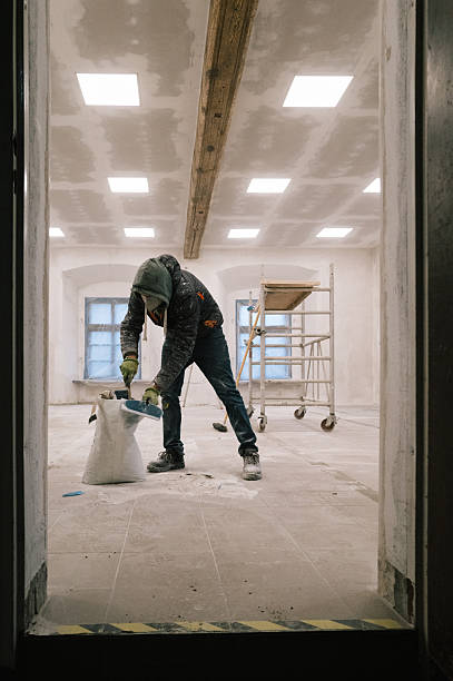 istock Construction site: Cleanup work and preparation for painting 2252357653