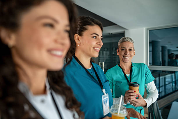 istock Nurses taking coffee break, smiling in hospital 2252358296
