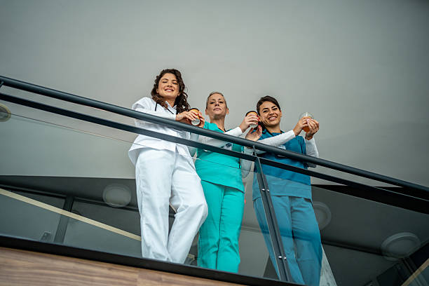 istock Healthcare team taking a break, drinking, and smiling 2252358312