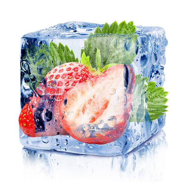 istock Fresh strawberries in ice cube isolated on white 2252358585