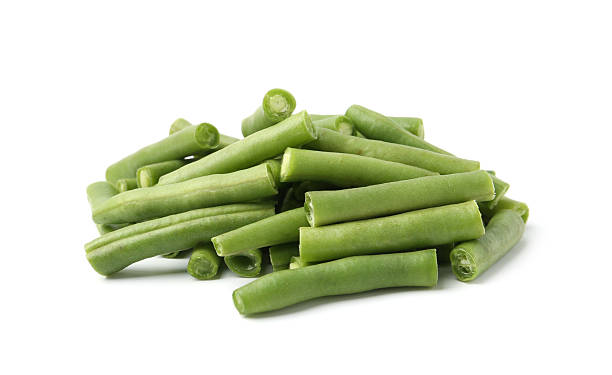 istock Pieces of fresh green beans isolated on white 2252359377