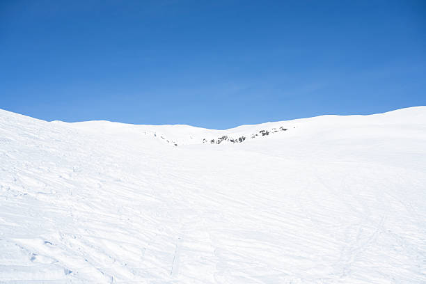 View from a ski slope at Myrkdalen Alpine Ski Resort in Norway, Scandinavia, Europe in winter (April). The image was captured with a full frame mirrorless digital camera and a sharp f/2.8 lens at low ISO (ISO 64) resulting in a large clean file. The image is part of a series of photographs from Norwegian winter resorts (including Myrkdalen, Voss, Geilo, Lillehammer and Jotunheimen).
