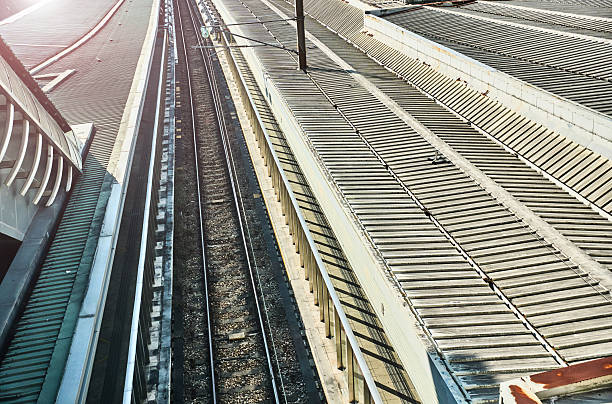 The Mass Transit Railway (MTR) refers to the rail transit system (including cable cars and feeder buses) serving the Hong Kong Special Administrative Region of the People's Republic of China. Formed by the merger of the Kowloon-Canton Railway and the Hong Kong Mass Transit Railway, it is a member of the International Association of Public Transport (CoMET). Its first line, the East Rail Line, commenced operations on October 1, 1910.According to the official MTR Corporation website as of October 2025, the MTR operates a total of 10 lines, comprising 9 rail and metro lines plus 1 Airport Express line. By 2025, the total operational mileage reached 245.3 kilometers (including urban lines, Airport Express, and Light Rail lines); Among these, the urban lines (excluding the Airport Express) comprise 96 stations with a total operational mileage of 201.8 kilometers; the Airport Express features 5 stations (3 of which are shared with the MTR Tung Chung Line) and operates over 35.2 kilometers; the Light Rail network includes 68 stations with a total operational mileage of 36.2 kilometers.