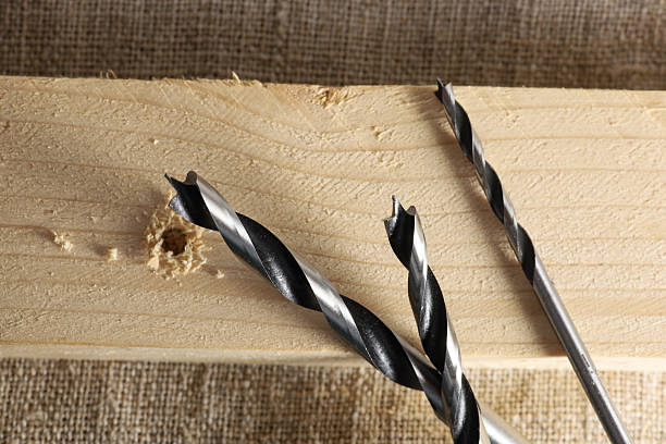 istock Drills on a wooden block 2252367654