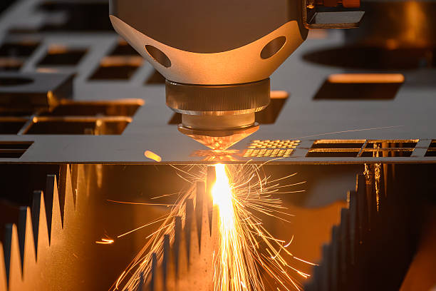 istock Close up scene the fiber laser cutting machine cut the metal plate control by CNC program. 2252368304