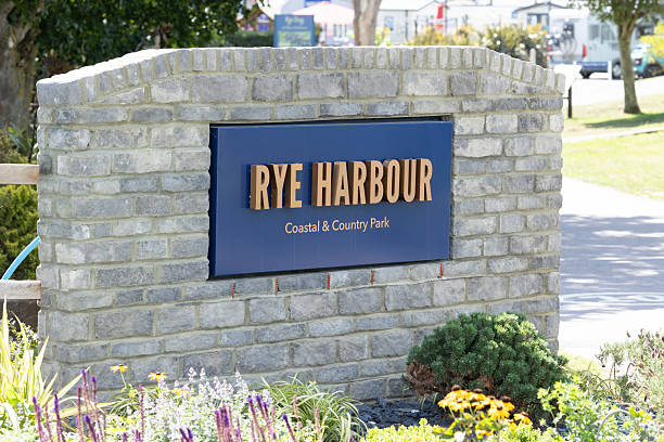 istock Rye Harbour Coastal Park Sign Mounted On A Stone Brick Wall 2252370630