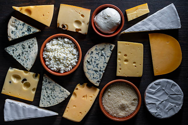istock Set of different cheeses on table background, closeup, top view . Various types of cheese 2252372130