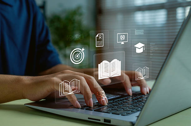 istock Hands typing on laptop with virtual e-learning and digital education icons, online course, ebook, knowledge sharing and smart learning technology concept for modern education. 2252373416