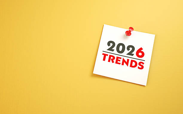istock 2026 New Year Trends Text Written on Note Paper Sitting on Yellow Background 2252375482