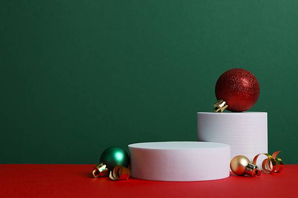 istock Beautiful composition with podium and Christmas decor on two-tone background 2252380599