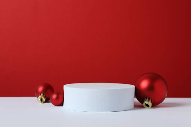 istock Beautiful composition with podium and Christmas decor on two-tone background 2252380632