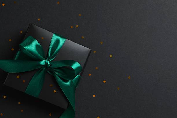 istock Beautiful gift box on black background 2252380836